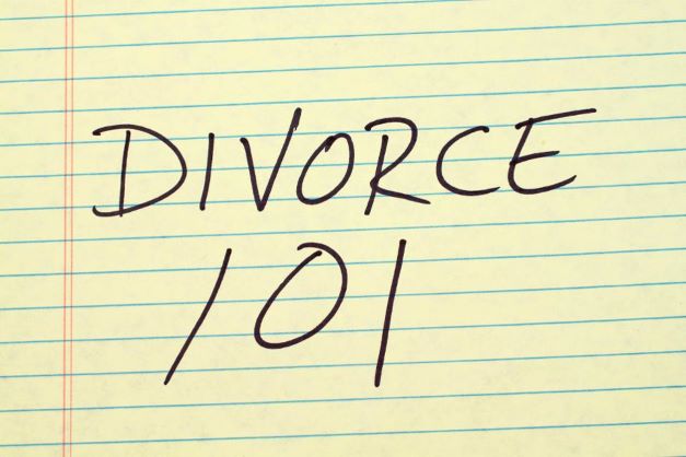 Divorce 101 written on a yellow piece of paper
